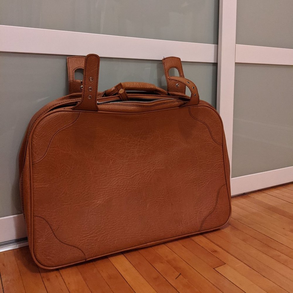 VINTAGE cognac zip suit case with buckles